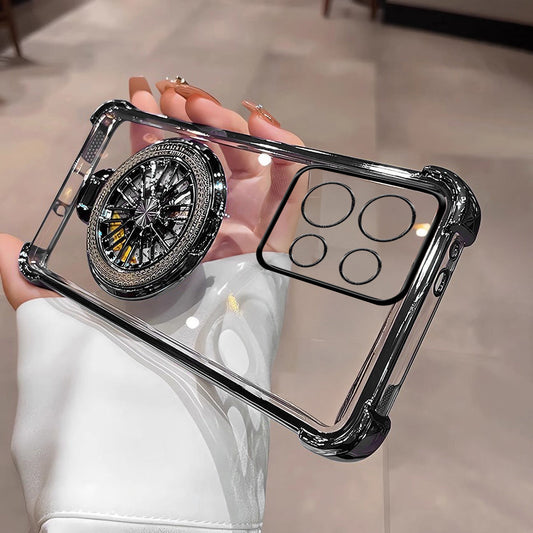 A clear phone case with a rotating wheel design on the back, held in a person's hand.
